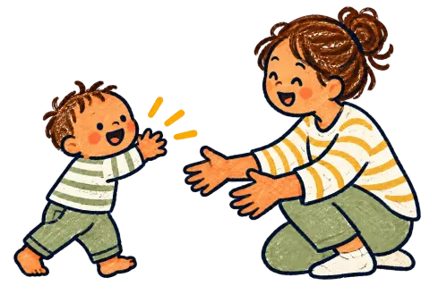 A toddler walking into the open arms of a caregiver.
